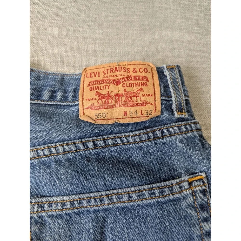 Levis 550 Relaxed Fit Jeans Mens 34x32 Medium Wash Blue Tapered Leg Paint Stains - Picture 2 of 15